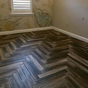 Porcelain plank tile install by Naples Abbey Carpet & Floor.